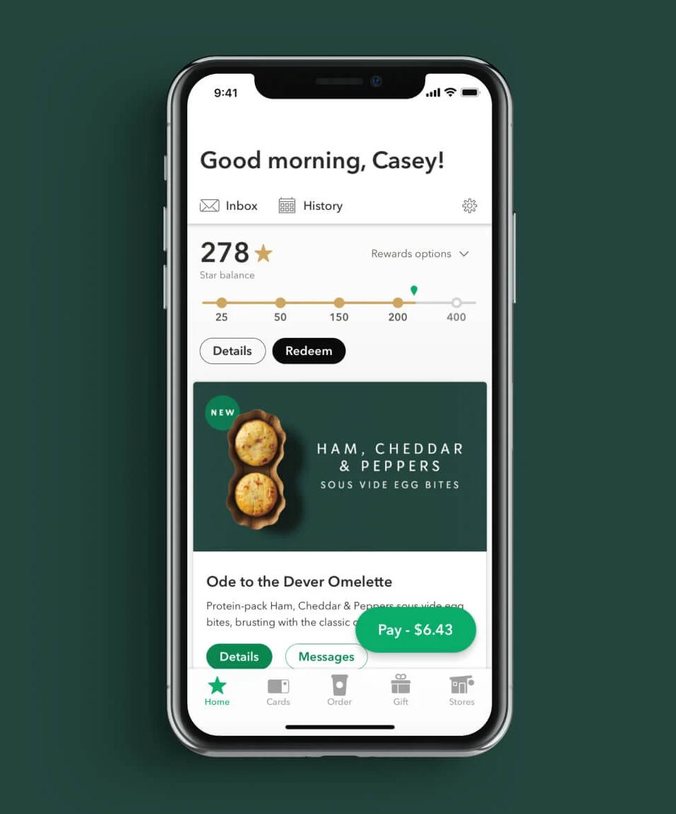 Smartphone displaying a loyalty program app with star balance, showing a featured item to increase what AOV means.