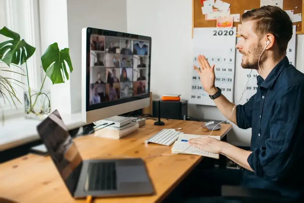 A diverse group of marketing professionals in a modern office collaborating on how to choose a digital marketing agency