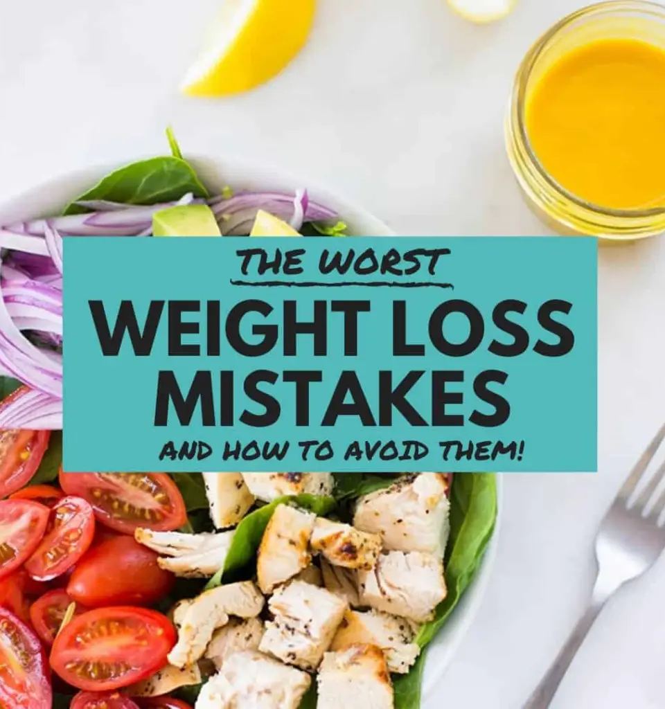 Salad with chicken and tomatoes, next to a dressing jar. The text overlay reads 'THE WORST WEIGHT LOSS MISTAKES AND HOW TO AVOID THEM!'