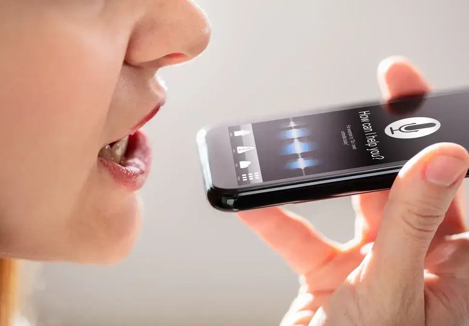 person using voice search through google