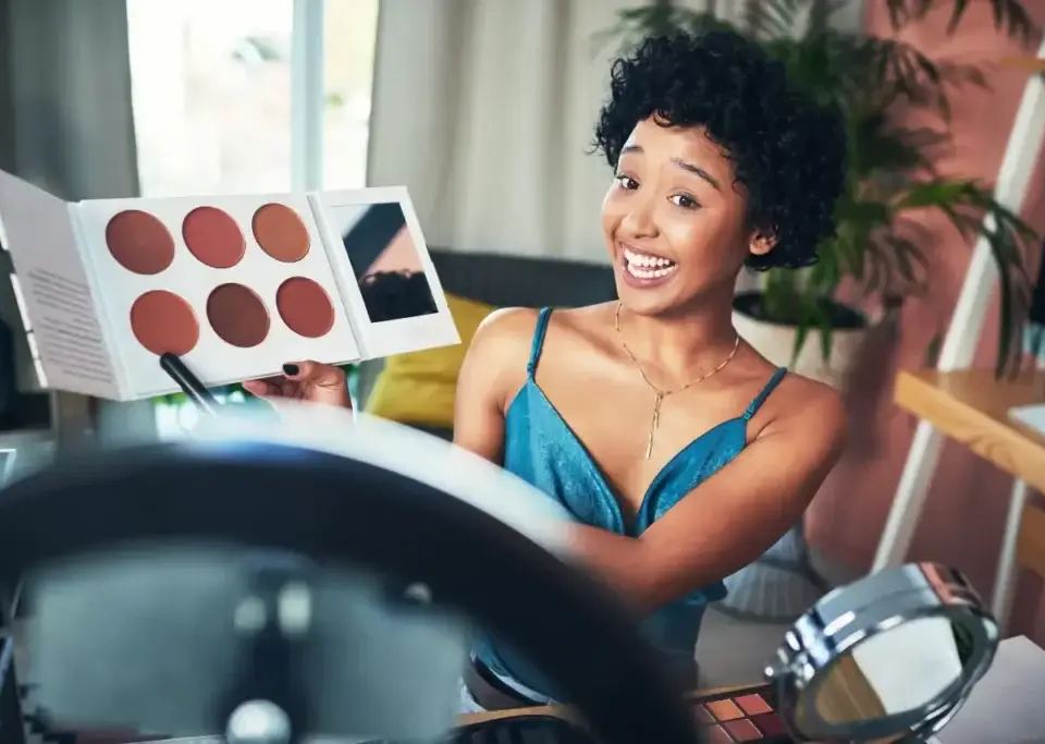 shot of an influencer recording a makeup tutorial