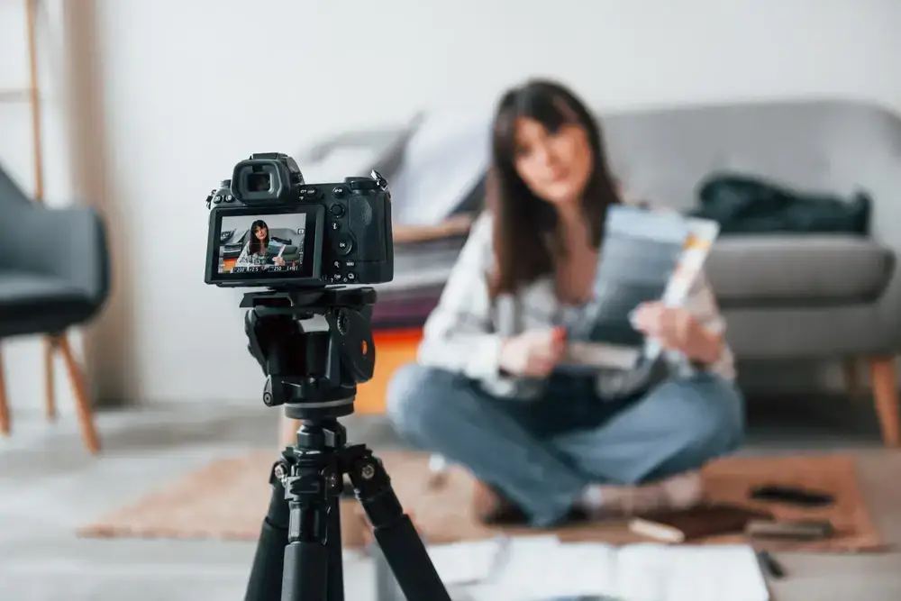 A strategist creating a content marketing plan on a tablet, aiming to drive sales with real-world examples