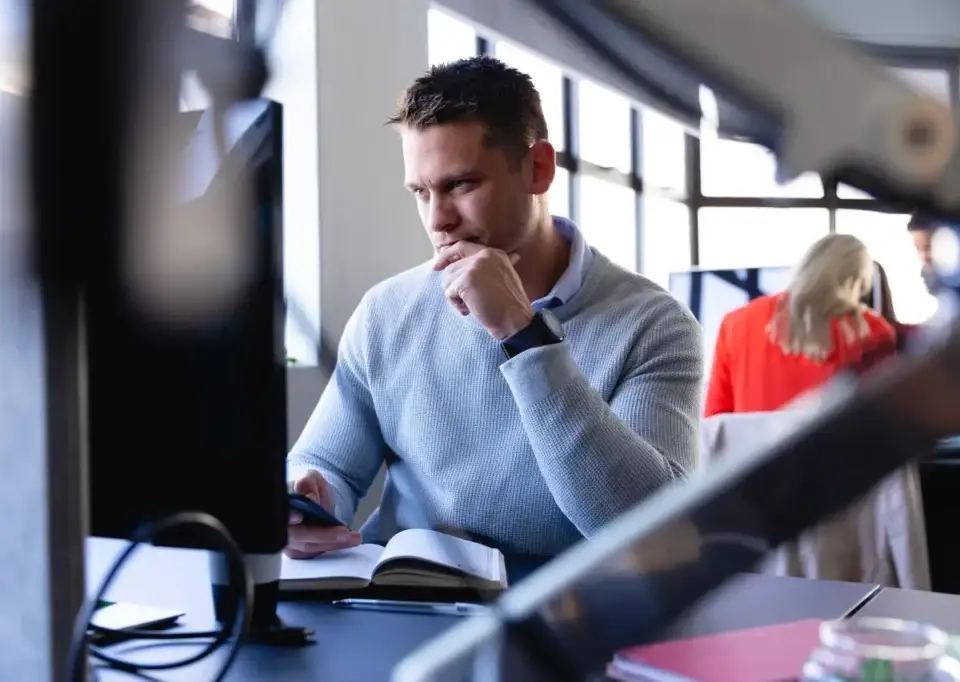 digital marketing agency expert deep in thought over marketing analytics.