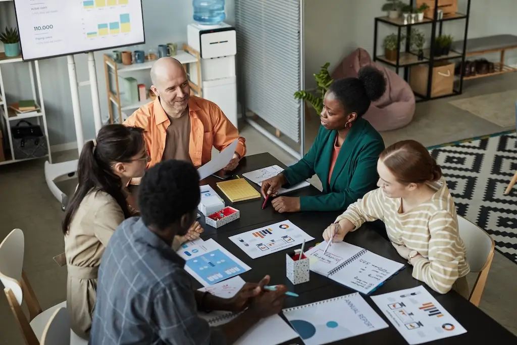 Five tips for a sustainable first-party data strategy are illustrated by hands sorting and organizing data blocks